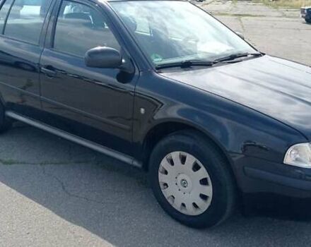 Черный Шкода Октавия, объемом двигателя 1.6 л и пробегом 273 тыс. км за 5600 $, фото 2 на Automoto.ua