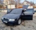 Черный Шкода Октавия, объемом двигателя 1.6 л и пробегом 195 тыс. км за 5900 $, фото 1 на Automoto.ua