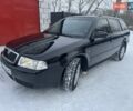 Черный Шкода Октавия, объемом двигателя 1.6 л и пробегом 210 тыс. км за 6000 $, фото 1 на Automoto.ua