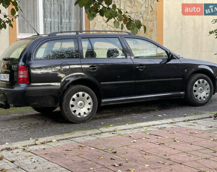Черный Шкода Октавия, объемом двигателя 1.6 л и пробегом 217 тыс. км за 5700 $, фото 2 на Automoto.ua
