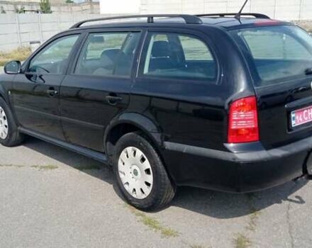 Черный Шкода Октавия, объемом двигателя 1.6 л и пробегом 273 тыс. км за 5600 $, фото 5 на Automoto.ua