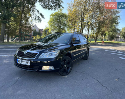Чорний Шкода Октавія, об'ємом двигуна 1.6 л та пробігом 145 тис. км за 8599 $, фото 2 на Automoto.ua