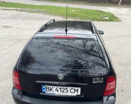 Черный Шкода Октавия, объемом двигателя 1.6 л и пробегом 201 тыс. км за 5650 $, фото 8 на Automoto.ua