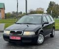 Черный Шкода Октавия, объемом двигателя 1.6 л и пробегом 241 тыс. км за 5550 $, фото 1 на Automoto.ua