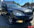 Черный Шкода Октавия, объемом двигателя 1.8 л и пробегом 188 тыс. км за 7800 $, фото 1 на Automoto.ua