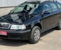 Черный Шкода Октавия, объемом двигателя 1.6 л и пробегом 179 тыс. км за 5800 $, фото 1 на Automoto.ua