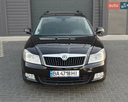 Черный Шкода Октавия, объемом двигателя 1.8 л и пробегом 245 тыс. км за 7350 $, фото 1 на Automoto.ua