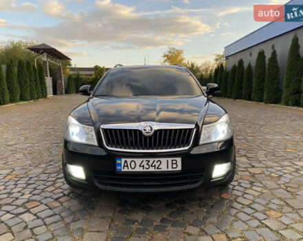 Шкода Октавия 2009 в Мукачеве на Automoto.ua Черный Шкода Октавия, объемом двигателя 1.6 л и пробегом 282 тыс. км за 7700 $, фото 1 на Automoto.ua