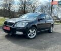 Черный Шкода Октавия, объемом двигателя 1.4 л и пробегом 224 тыс. км за 6499 $, фото 1 на Automoto.ua