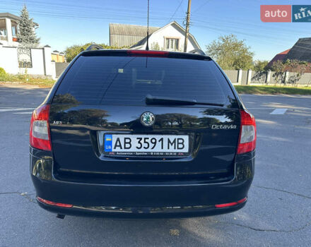 Чорний Шкода Октавія, об'ємом двигуна 1.6 л та пробігом 145 тис. км за 8599 $, фото 7 на Automoto.ua