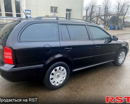 Чорний Шкода Октавія, об'ємом двигуна 1.6 л та пробігом 137 тис. км за 7300 $, фото 4 на Automoto.ua