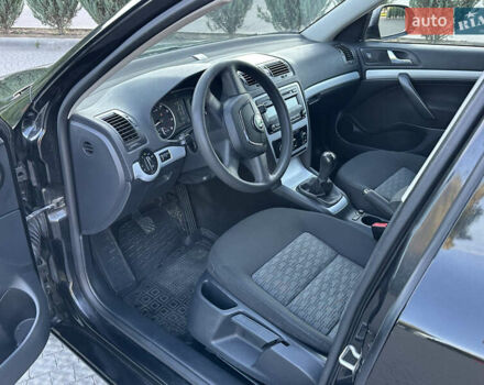 Шкода Октавия 2009 в Полтаве на Automoto.ua Черный Шкода Октавия, объемом двигателя 1.8 л и пробегом 195 тыс. км за 7799 $, фото 54 на Automoto.ua