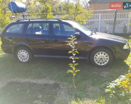 Черный Шкода Октавия, объемом двигателя 1.6 л и пробегом 130 тыс. км за 6199 $, фото 1 на Automoto.ua