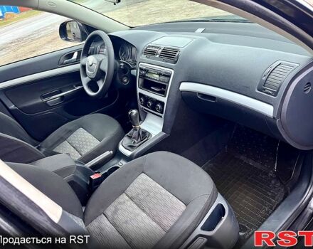 Черный Шкода Октавия, объемом двигателя 1.4 л и пробегом 165 тыс. км за 6999 $, фото 10 на Automoto.ua