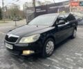 Черный Шкода Октавия, объемом двигателя 1.8 л и пробегом 230 тыс. км за 6300 $, фото 1 на Automoto.ua