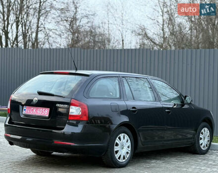 Черный Шкода Октавия, объемом двигателя 1.6 л и пробегом 202 тыс. км за 7490 $, фото 90 на Automoto.ua