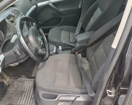 Черный Шкода Октавия, объемом двигателя 1.6 л и пробегом 192 тыс. км за 8500 $, фото 6 на Automoto.ua