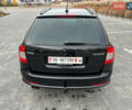 Черный Шкода Октавия, объемом двигателя 2 л и пробегом 265 тыс. км за 11950 $, фото 12 на Automoto.ua