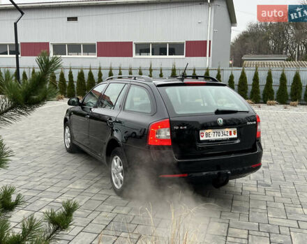 Черный Шкода Октавия, объемом двигателя 2 л и пробегом 229 тыс. км за 11650 $, фото 171 на Automoto.ua