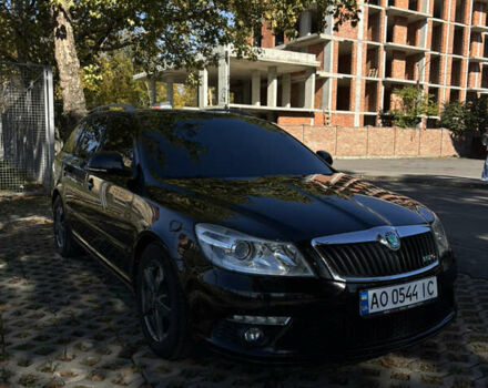 Шкода Октавия 2010 в Мукачеве на Automoto.ua Черный Шкода Октавия, объемом двигателя 1.98 л и пробегом 220 тыс. км за 9000 $, фото 1 на Automoto.ua