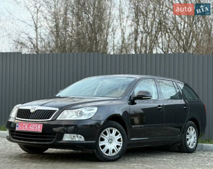 Черный Шкода Октавия, объемом двигателя 1.6 л и пробегом 202 тыс. км за 7490 $, фото 60 на Automoto.ua