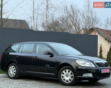 Черный Шкода Октавия, объемом двигателя 1.6 л и пробегом 202 тыс. км за 7490 $, фото 75 на Automoto.ua