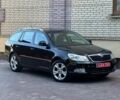 Черный Шкода Октавия, объемом двигателя 1.4 л и пробегом 217 тыс. км за 6300 $, фото 1 на Automoto.ua