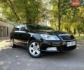 Черный Шкода Октавия, объемом двигателя 1.4 л и пробегом 224 тыс. км за 6850 $, фото 1 на Automoto.ua