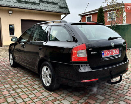 Чорний Шкода Октавія, об'ємом двигуна 1.6 л та пробігом 114 тис. км за 8299 $, фото 4 на Automoto.ua