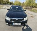 Черный Шкода Октавия, объемом двигателя 1.6 л и пробегом 228 тыс. км за 7426 $, фото 1 на Automoto.ua