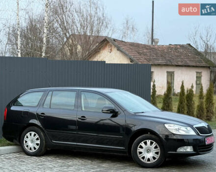 Черный Шкода Октавия, объемом двигателя 1.6 л и пробегом 202 тыс. км за 7490 $, фото 77 на Automoto.ua