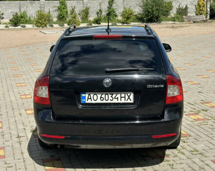 Чорний Шкода Октавія, об'ємом двигуна 2 л та пробігом 296 тис. км за 7800 $, фото 4 на Automoto.ua