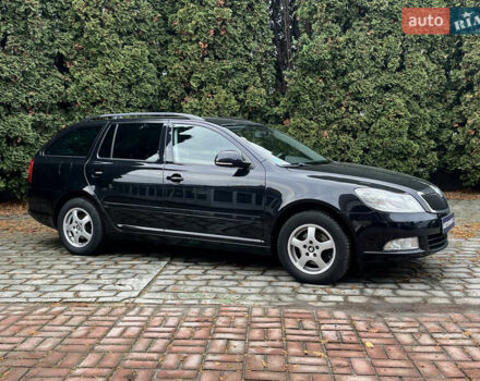 Черный Шкода Октавия, объемом двигателя 1.4 л и пробегом 229 тыс. км за 7800 $, фото 1 на Automoto.ua