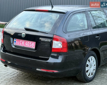 Черный Шкода Октавия, объемом двигателя 1.6 л и пробегом 202 тыс. км за 7490 $, фото 95 на Automoto.ua