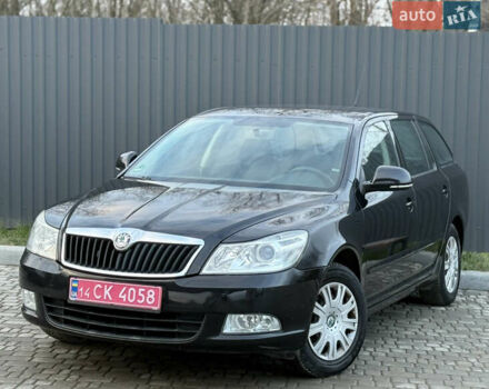 Черный Шкода Октавия, объемом двигателя 1.6 л и пробегом 202 тыс. км за 7490 $, фото 1 на Automoto.ua