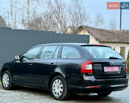 Черный Шкода Октавия, объемом двигателя 1.6 л и пробегом 202 тыс. км за 7490 $, фото 105 на Automoto.ua