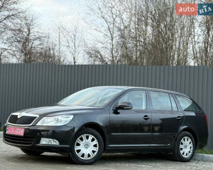 Черный Шкода Октавия, объемом двигателя 1.6 л и пробегом 202 тыс. км за 7490 $, фото 63 на Automoto.ua