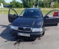 Черный Шкода Октавия, объемом двигателя 1.6 л и пробегом 174 тыс. км за 6800 $, фото 1 на Automoto.ua