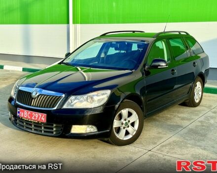 Черный Шкода Октавия, объемом двигателя 14 л и пробегом 225 тыс. км за 7500 $, фото 2 на Automoto.ua