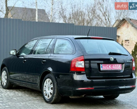 Черный Шкода Октавия, объемом двигателя 1.6 л и пробегом 202 тыс. км за 7490 $, фото 102 на Automoto.ua