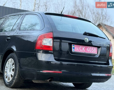 Черный Шкода Октавия, объемом двигателя 1.6 л и пробегом 202 тыс. км за 7490 $, фото 111 на Automoto.ua