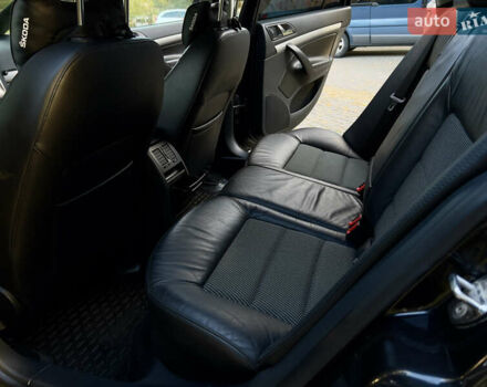 Чорний Шкода Октавія, об'ємом двигуна 1.6 л та пробігом 330 тис. км за 7499 $, фото 39 на Automoto.ua