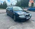 Черный Шкода Октавия, объемом двигателя 1.6 л и пробегом 230 тыс. км за 5800 $, фото 1 на Automoto.ua
