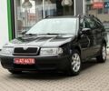 Черный Шкода Октавия, объемом двигателя 1.6 л и пробегом 218 тыс. км за 6900 $, фото 1 на Automoto.ua