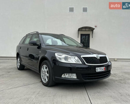Черный Шкода Октавия, объемом двигателя 2 л и пробегом 229 тыс. км за 11650 $, фото 4 на Automoto.ua