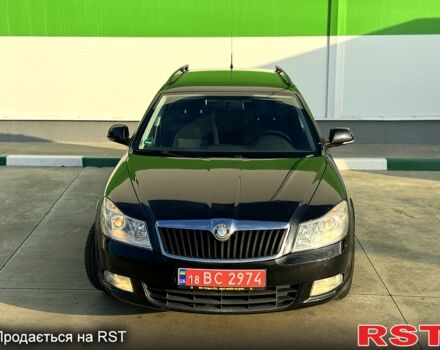 Черный Шкода Октавия, объемом двигателя 14 л и пробегом 225 тыс. км за 7500 $, фото 1 на Automoto.ua