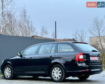 Черный Шкода Октавия, объемом двигателя 1.6 л и пробегом 202 тыс. км за 7490 $, фото 109 на Automoto.ua