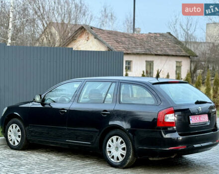 Черный Шкода Октавия, объемом двигателя 1.6 л и пробегом 202 тыс. км за 7490 $, фото 107 на Automoto.ua