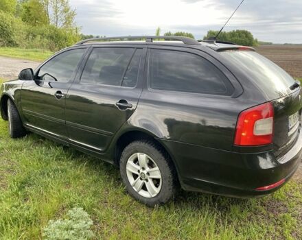 Черный Шкода Октавия, объемом двигателя 1.6 л и пробегом 279 тыс. км за 5100 $, фото 1 на Automoto.ua