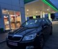 Черный Шкода Октавия, объемом двигателя 1.4 л и пробегом 235 тыс. км за 6500 $, фото 1 на Automoto.ua